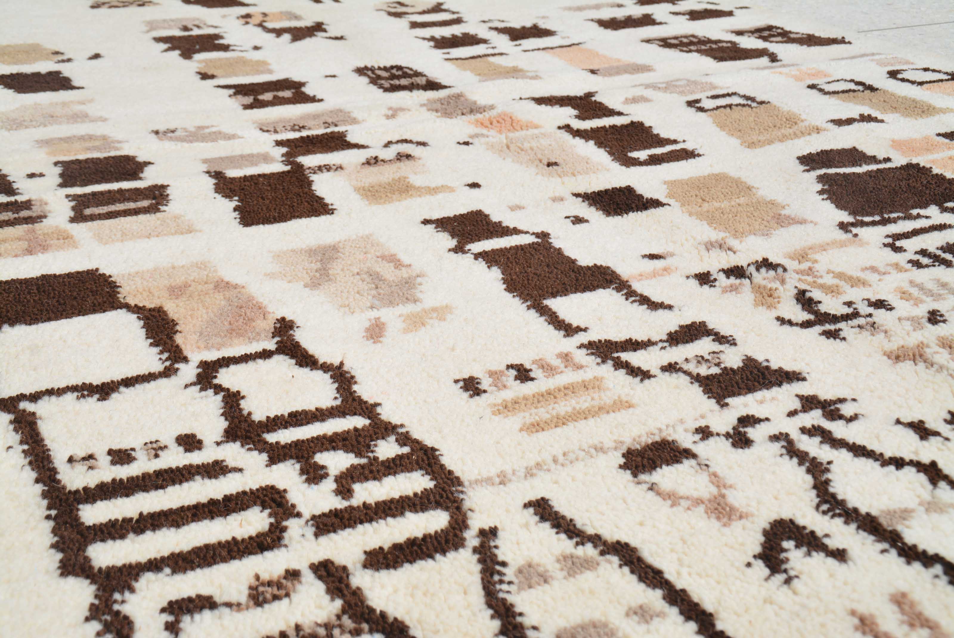 Nomad's Journey Handmade Moroccan Rug - Earthy Colors & Intricate Patterns | Illuminate Collective